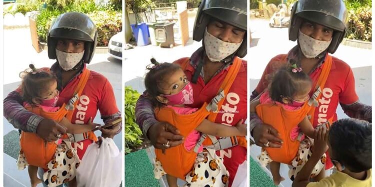 બાળકીને ખોળામાં લઈને ભોજન પહોંચાડવા આવ્યો વ્યક્તિ, વીડિયો જોયા બાદ લોકોએ કહ્યું- આ પિતા જ છે અસલી હીરો